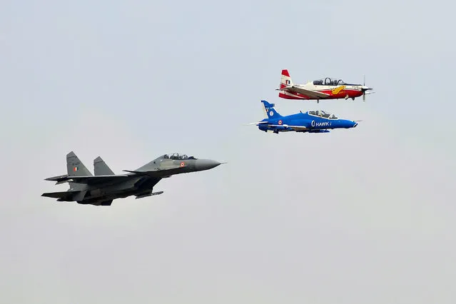 The Indian Air Force planes perform during the inauguration of Aero India show at the Yelahanka Air Force Station in Bengaluru, India, February 14, 2017. (Photo by Abhishek N. Chinnappa/Reuters)