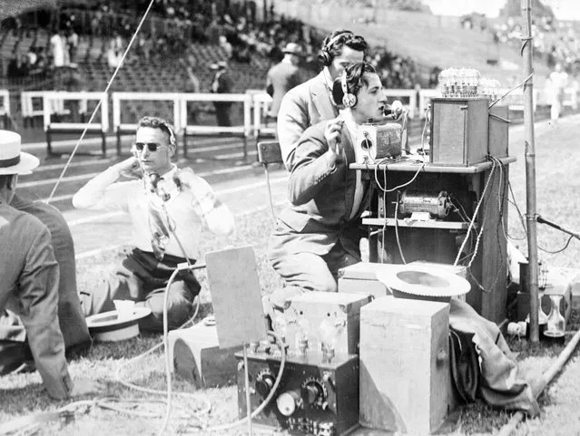Original caption from Paris, France, July 1924: This photo shows the radio station at the Colombes Stadium, by means of which spectators were able to follow the progress of the marathon race. Scouts along the route reported to this station by telephone, and a series of amplifiers carried the information to the thousands in the stands. (Phoot by Bettmann Archive)
