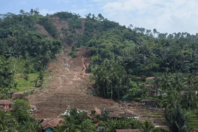 General view of a landslide site in Cipongkor, West Java province on March 25, 2024. At least nine Indonesians were reported missing overnight and more than 200 were evacuated after a landslide and flooding hit their village on Java island, an official said on March 25. (Photo by Timur Matahari/AFP Photo)