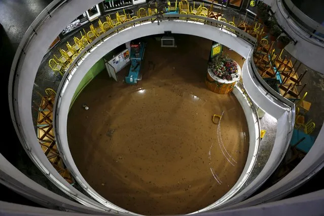 A view of a flooded commercial center in Santiago April 17, 2016. (Photo by Ivan Alvarado/Reuters)