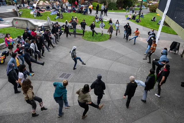 Student and community members perform a “Dabke” traditional Palestine dance supporting Pro-Palestinian protestors locked inside Siemens Hall at Cal Poly Humboldt on Tuesday, April 23, 2024 in Arcata. The protest, one of many happening at college campuses around the country, is in response to Israel's invasion of Gaza after Hamas' surprise attack on Oct. 7. The attack killed 1,400 people in Israel, and since then, the war in Gaza has killed approximately 33,600 Palestinians and injured more than 76,200. (Photo by Paul Kitagaki Jr/ZUMA Press Wire/Rex Features/Shutterstock)