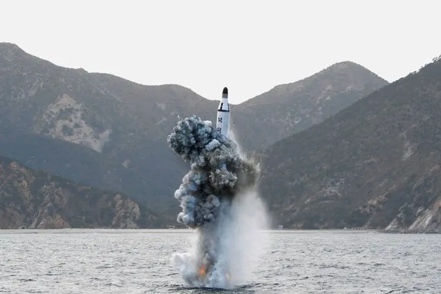 North Korean leader Kim Jong Un guides on the spot the underwater test-fire of strategic submarine ballistic missile in this undated photo released by North Korea's Korean Central News Agency (KCNA) in Pyongyang on April 24, 2016. (Photo by Reuters/KCNA)