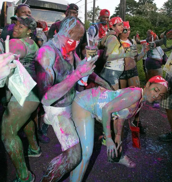 The world-famous sprinter Usain Bolt, 30, took a break from the track to celebrate Carnival as revellers doused each other with paint in Trinidad and Tobago on February 26, 2017. (Photo by David Wears/Splash News and Pictures)