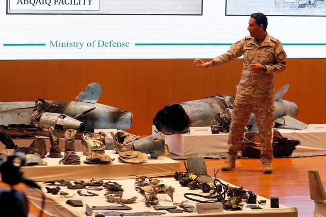 Saudi Defense Ministry spokesman Colonel Turki Al-Malik addresses a press conference next to the remains of the missiles allegedly used in the attack against Aramco oil facility, Riyadh, Saudi Arabia, 18 September 2019. According to reports, Al-Malik said 25 Iranian-made drones came from the north to attack the facility, and showed what the Saudis said were the remains of cruise missiles and drones used in an attack. (Photo by EPA/EFE/Stringer)