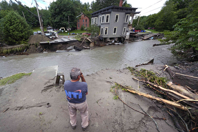 Rick Gordon, of Plainfield, Vt. looks at what remains of Mill Street and an apartment building after remnants of Hurricane Beryl caused flooding and destruction, Friday, July 12, 2024, in Plainfield. (Photo by Charles Krupa/AP Photo)