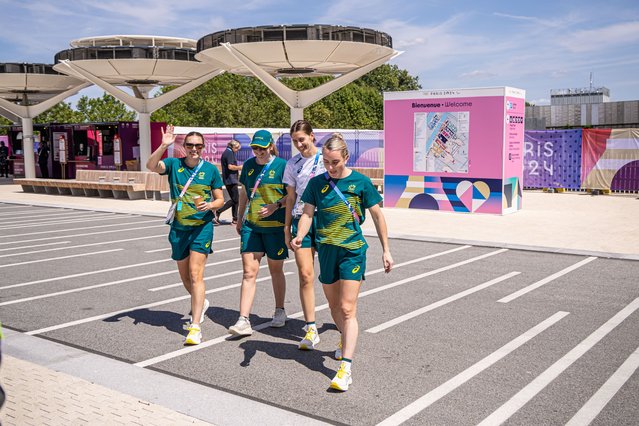 Members of the Australian delegation walk at the Athletes' Village of the Paris 2024 Olympic Games in Saint Denis, France, 18 July 2024. The Summer Olympics are scheduled to take place from 26 July to 11 August 2024 in Paris. (Photo by Christophe Petit Tesson/EPA/EFE)