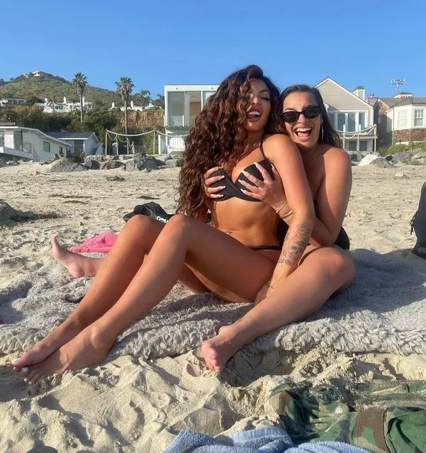 English singer, who was a member of the British girl group Little Mix from 2011 to 2020 Jesy Nelson (L) looked incredible as she hit the beach in a black bikini with palsin the first decade of March 2022. The pop star, who is currently living it up in Malibu, let her hair down underneath blue skies on the west coast. (Photo by Instagram)