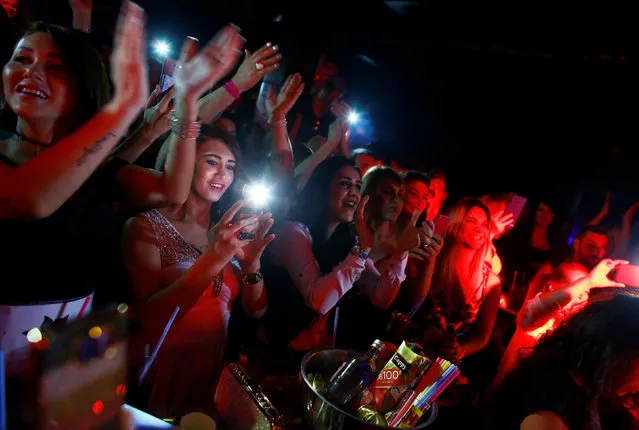 People cheer during the Angel of Turkey transgender/transsexual beauty pageant in Istanbul, Turkey, late May 26, 2016. (Photo by Murad Sezer/Reuters)