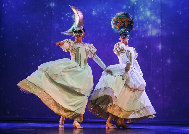 Stage actresses perform during the premiere performance of “Planets Moved By Dance” directed by Romana Agnel at the Variete Theater in Krakow, Poland on March 24, 2023. The premiere of “Planet moved by dance” is a tribute to Nicolaus Copernicus. This performance, commemorating the 550th anniversary of his birth and performed on the 480th anniversary of his death. (Photo by Artur Widak/Anadolu Agency via Getty Images)