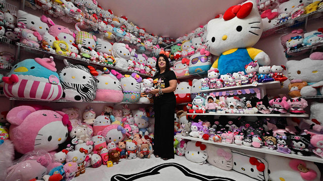 In this picture taken on October 19, 2024, Helen, founder of the 'Hello Kitty SoCal Babes' fan club, poses with her collection inside her “she-shed” in Riverside County, California. Hello Kitty marks its 50th anniversary on November 1, adorning everything from handbags to rice cookers and raking in billions of dollars for her Japanese creators Sanrio. (Photo by Frederic J. Brown/AFP Photo)