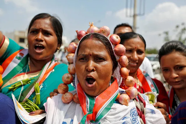 Supporters of India's main opposition Congress party attend a protest against what they say is a rise in the prices of essential food items and fuel, in Ahmedabad, India, June 27, 2016. (Photo by Amit Dave/Reuters)