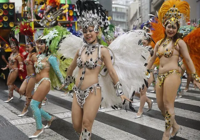 Japanese samba dancers perform during the 34th annual Asakusa Samba Carnival in Tokyo August 29, 2015. (Photo by Toru Hanai/Reuters)