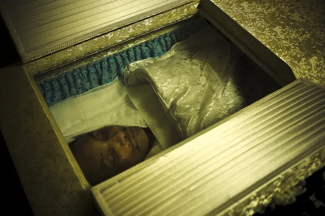 Miyamoto-san in his coffin after his death, during his wake – 2010. (Photo and caption by Anton Kusters)