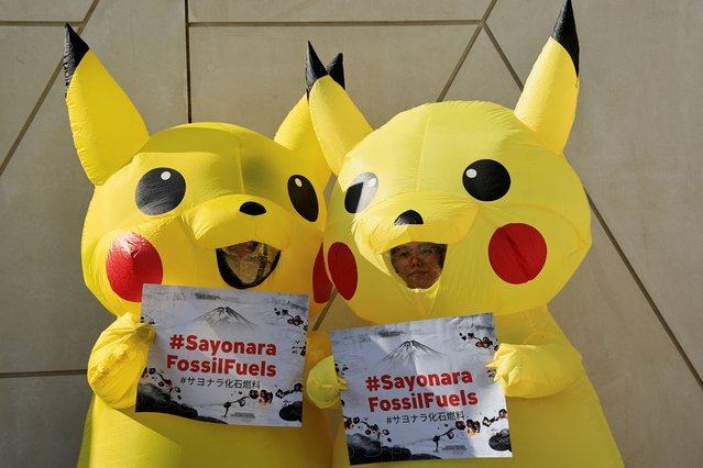 Activists dressed as Pikachu participate in a protest against fossil fuel, at the United Nations Climate Change Conference (COP28) in Dubai, United Arab Emirates on December 4, 2023. (Photo by Thaier Al Sudani/Reuters)