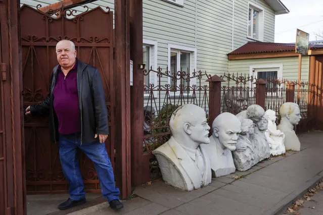 In this photo taken on Monday, October 23, 2017, Belarusian Nikolai Pankrat, 63, collector, in his private museum in the town of Polatsk, 220 km (137 miles) north of Minsk, Belarus. Pankrat, a retired military man, has assembled a collection more than 10,000 pieces of memorabilia commemorating the Bolshevik leader, including 500 busts, jammed into eye-straining rooms in his home. (Photo by Sergei Grits/AP Photo)
