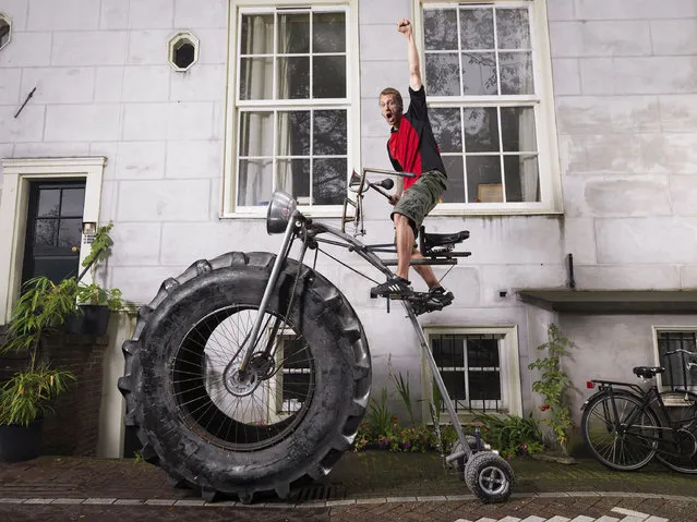 Wouter van den Bosch – Heaviest Rideable Bicycle. At 1,650 pounds, this bike built by Wouter van den Bosch of the Netherlands is the heaviest rideable bike in the world – and was ridden in Arnhem (also in the Netherlands) back in 2010. Guinness World Records 2011. Location: Amsterdam, Netherlands. (Photo by  Ranald Mackechnie/Guinness World Records)