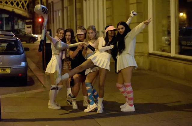 A group of girls playing pub golf hit the bars in Newcastle, United Kingdom on September 11, 2020. It comes as thousands of drinkers hit the town for one last blowout before the new rule of six comes into force on Monday. (Photo by North News and Pictures/The Sun)