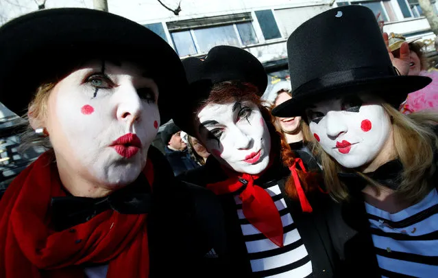 Carnival revellers at the traditional “Rosenmontag” Rose Monday carnival parade in Mainz, Germany on February 12, 2018. (Photo by Ralph Orlowski/Reuters)