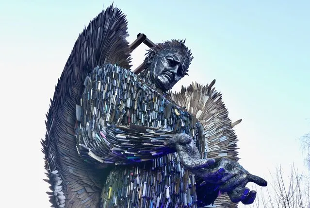 The Knife Angel at Arbour Park in Berkshire, United Kingdom on January 11, 2023. A sculpture made from knives has arrived in Slough in a bid to raise awareness about violent crime. Standing 27ft (8m) high, the Knife Angel is made from about 100,000 bladed weapons collected through knife amnesty bins from 43 police forces. It features messages from families of the victims of knife crime engraved on its wings. Members of Thames Valley Police will be at the sculpture daily to talk about knife crime with anyone visiting. (Photo by Geoffrey Swaine/Rex Features/Shutterstock)