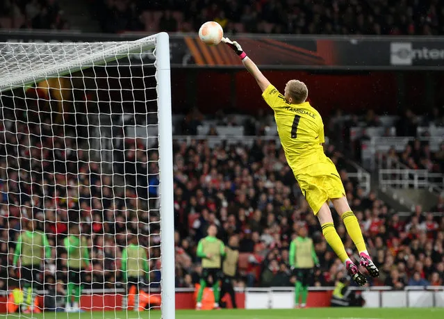 Aaron Ramsdale of Arsenal fails to save a shot from Pedro Goncalves of Sporting CP (not pictured) as he scores their side's first goal during the UEFA Europa League round of 16 leg two match between Arsenal FC and Sporting CP at Emirates Stadium on March 16, 2023 in London, England. (Photo by Shaun Botterill/Getty Images)