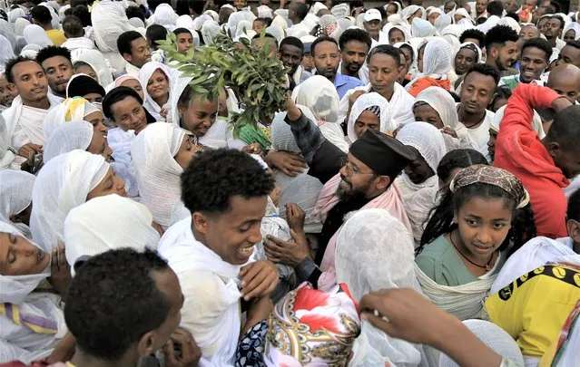Ethiopians celebrate Good Friday in Addis Ababa, Ethiopia, Friday April 14, 2023. Millions of Orthodox Christians commemorate Good Friday, also known as “Great Friday” to remember the events leading up to Jesus' crucifixion. (Photo by AP Photo)