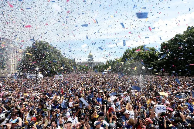 Confetti flies over the crowd during the Denver Nuggets victory parade and rally after winning the 2023 NBA Championship at Civic Center Park on June 15, 2023 in Denver, Colorado. (Photo by Matthew Stockman/Getty Images)