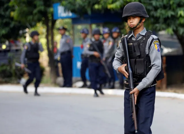 A police guards during arrival of former U.N. Secretary-General Kofi Annan as he visits in his capacity as Myanmar government-appointed Chairman of the Advisory Commission on Rakhine State, near Sittwe airport, Rakhine state, Myanmar December 2, 2016. (Photo by Soe Zeya Tun/Reuters)