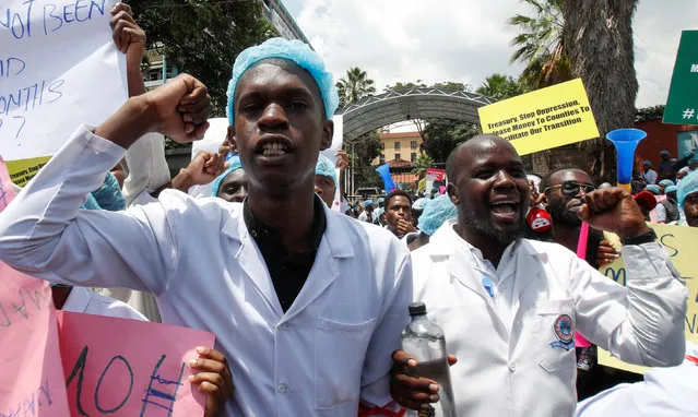 Medical practitioners chant slogans as they participate in a demonstration against the government's failure to hire trainee doctors, outside the Ministry of Health in Nairobi, Kenya, on March 4 2024. (Photo by Monicah Mwangi/Reuters)