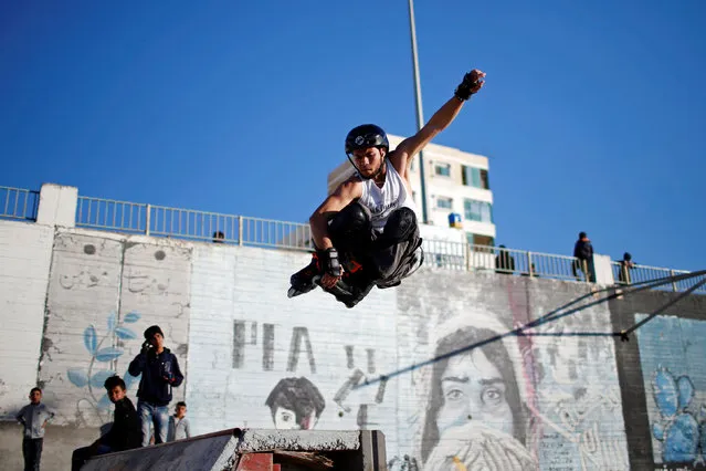 Palestinian Mohammad Al-Sawalhe, 23, a member of Gaza Skating Team, practices his rollerblading skills in Gaza City March 8, 2019. (Photo by Mohammed Salem/Reuters)