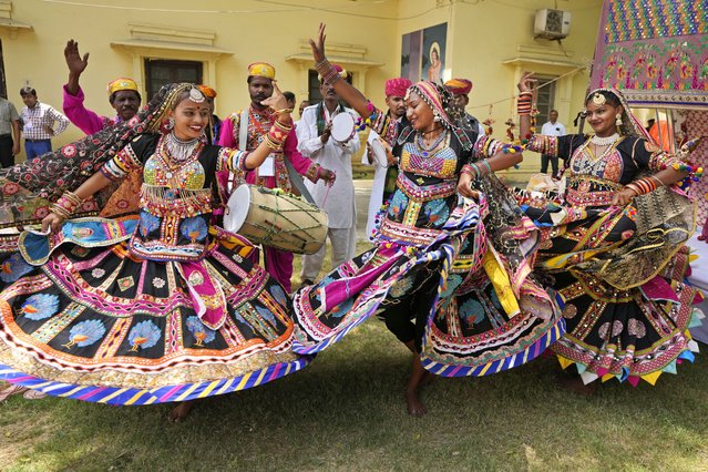 Folk artists from Rajasthan state perform a traditional dance during the alumni meet at the University of Allahabad in Prayagraj, Uttar Pradesh, India, April 28, 2024. (Photo by Rajesh Kumar Singh/AP Photo)