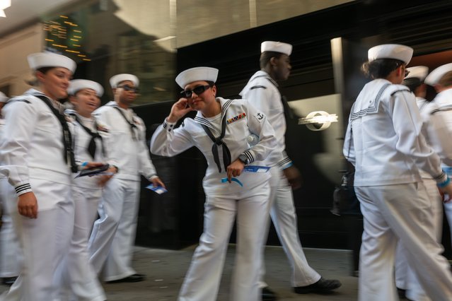 U.S. Navy sailors walk through Times Square on the first day of Fleet Week on May 22, 2024 in New York City. Fleet Week brings thousands of active service members to New York City for a week of ship tours, concerts, demonstrations, and other events that give New Yorkers a close-up view of the U.S. military. (Photo by Spencer Platt/Getty Images)