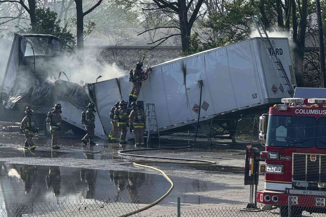 This photo released by the Columbus Fire Department shows firefighters tending to a fire that began on a trailer carrying lithium batteries in Columbus, Ohio on Thursday, April 18, 2024. (Photo by Columbus Fire Department via AP Photo)