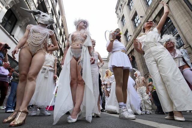 Members of Cabaret Mademoiselle take part in Belgian and European Pride 2023 in Brussels on May 20, 2023. (Photo by Yves Herman/Reuters)