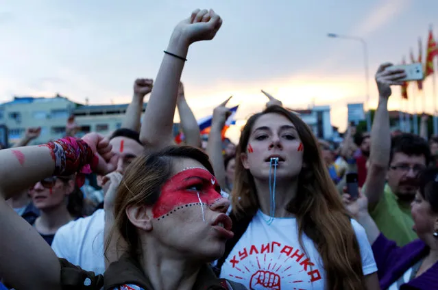 A protester shouts anti government slogans during a protest against the government, in front a government building in Skopje, Macedonia, June 6, 2016. (Photo by Ognen Teofilovski/Reuters)