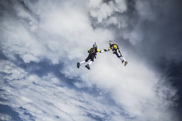 Fred Fugen and Vincent Reffet seen training for a jump over Austria on May 12, 2014. Fearless skydivers jump from an altitude of 10,000 meters above the largest mountain in Europe. Frederic Fugen, 34, and Vincent Reffet, 29, leapt from a plane in the freezing skies above Mont-Blanc in the French Alps. (Photo by Dominique Daher/Barcroft Media)