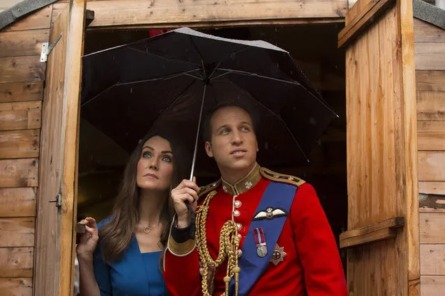 “The Duke and Duchess of Cambridge” outside the Summerhall arts venue in Edinburgh, Scotland, where their creator Alison Jackson is holding a live performance of her work called La Trashiata. (Photo by James Glossop/The Times/SIPA Press/News Syndication)