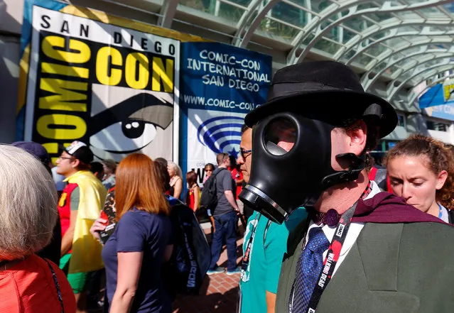 An attendee dressed as Sandman arrives for opening day of the annual Comic-Con International in San Diego, California, United States July 21, 2016. (Photo by Mike Blake/Reuters)