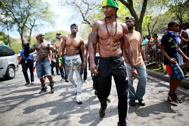 Revelers participate in the annual West Indian Day parade held on September 1, 2014 in the Brooklyn borough of New York City. (Photo by Yana Paskova/Getty Images)
