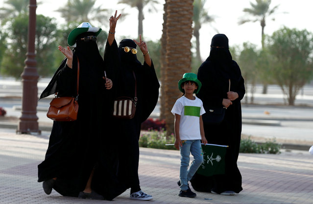 Women arrive to a rally to celebrate the 87th annual National Day of Saudi Arabia in Riyadh, September 23, 2017. (Photo by Faisal Al Nasser/Reuters)
