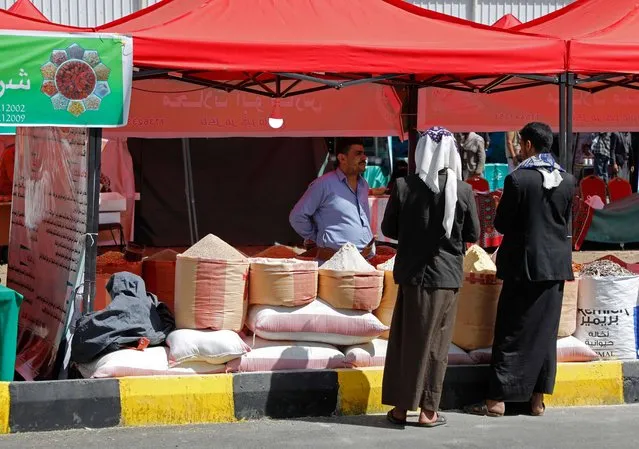 A Yemeni vendor displays various types of dry goods at a traditional market in Sanaa, Yemen, on Saturday, October 1, 2022. Yemen’s warring parties face a deadline to renew a 6-month long truce on October 2. The conflict has left many Yemenis on the brink of starvation and food prices have spiked again amid an ongoing worldwide food crises. (Photo by Hani Mohammed/AP Photo)
