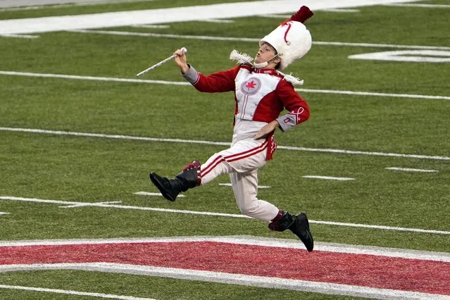 Ohio State drum major performs during the NCAA football game between the Ohio State Buckeyes and Notre Dame Fighting Irish at Ohio Stadium in Columbus on September 3, 2022. (Photo by Adam Cairns/USA TODAY Sports)