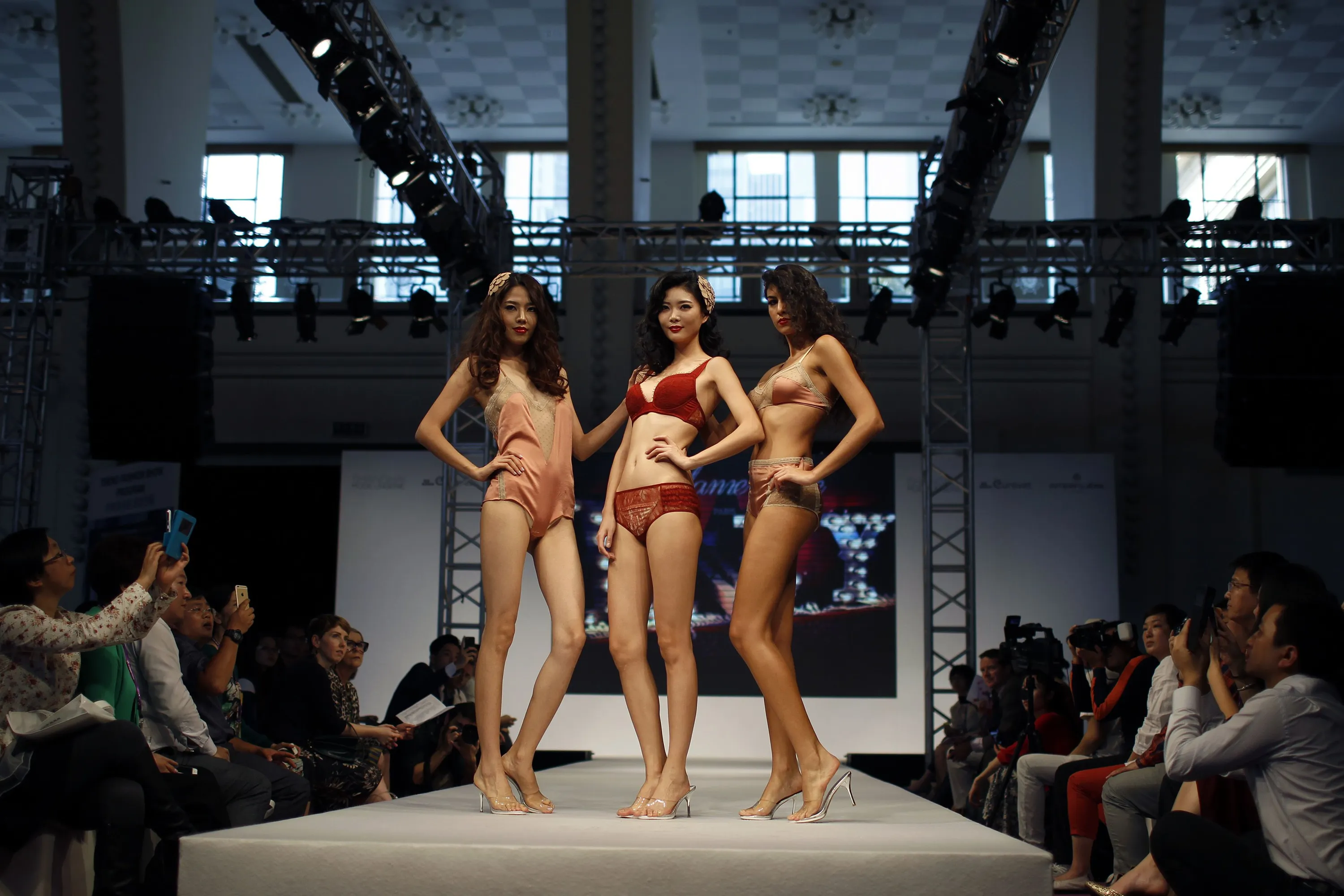 Next picture →. Models present a lingerie show during Shanghai Mode Lingeri...