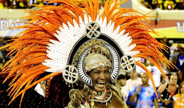 Performers from the Uniao da Ilha do Governador samba school parade during celebrations at the Sambadrome in Rio de Janeiro.  (Photo by Hassan Ammar/Associated Press)