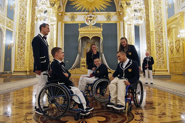 Members of Russian Paralympic national team wait for their meeting with Russian President Vladimir Putin in Moscow, Russia, 19 September 2016. Athletes from the Russian Paralympic Team were banned from participating in the Rio 2016 Paralympic Games in Brazil. (Photo by Yuri Kochetkov/EPA)