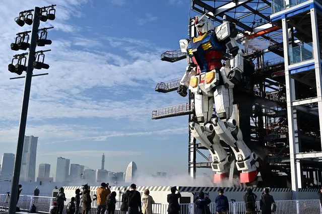 A Gundam robot is displayed at the Gundam factory in Yokohama, Kanagawa prefecture on November 30, 2020. (Photo by Charly Triballeau/AFP Photo)