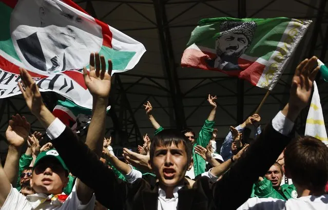 Terek Grozny fans support their team during a soccer match against Amkar Perm at the Akhmad Arena stadium in the Chechen capital Grozny April 27, 2013. (Photo by Maxim Shemetov/Reuters)