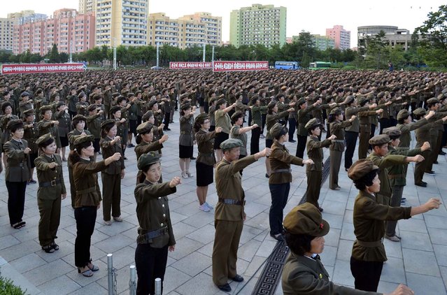 This file photo taken on August 11, 2017 and released by North Korea's official Korean Central News Agency (KCNA) on August 12, 2017 shows North Korean youths and workers and trade union members holding a rally to protest the UN Security Council's “sanctions resolution” at the compound of the Monument to Party Founding in Pyongyang. The United States layered a new round of sanctions on North Korea on October 26, 2017, blacklisting  individuals and organizations involved in security and forced labor policies for “ongoing and serious human rights abuses”. Amid the ongoing standoff over Pyongyang's threatening nuclear posture towards Japan and the United States, the US Treasury sought to boost pressure by placing the financial restrictions on seven senior officials and three state units. (Photo by AFP Photo/KCNA via KNS)