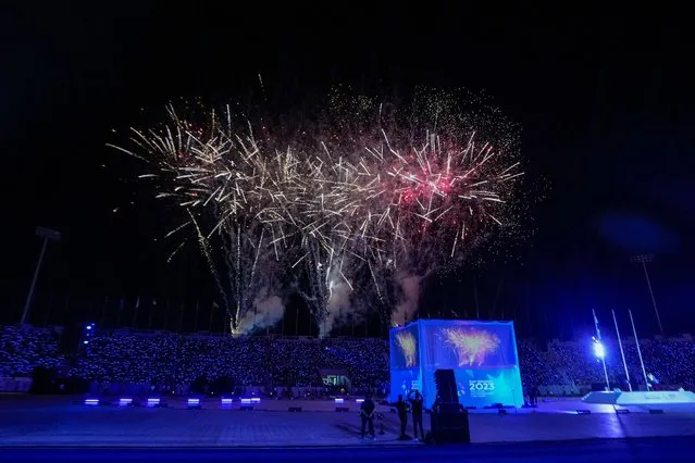 Fireworks explode over the Jorge "el magico" Gonzalez stadium during the opening ceremony of the Central American and Caribbean Games in San Salvador, El Salvador, Friday, June 23, 2023. (Photo by Arnulfo Franco/AP Photo)