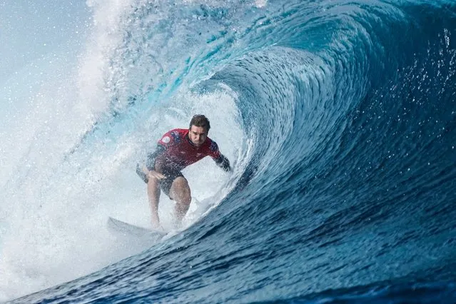 Australian surfer Ryan Callinan rides a wave at Teahupo'o in Tahiti, French Polynesia on August 15, 2023, during WSL Shiseido Tahiti pro surfing event. Teahupo'o will host the surfing event of the Paris 2014 Olympic Games. (Photo by Jerome Brouillet/AFP Photo)