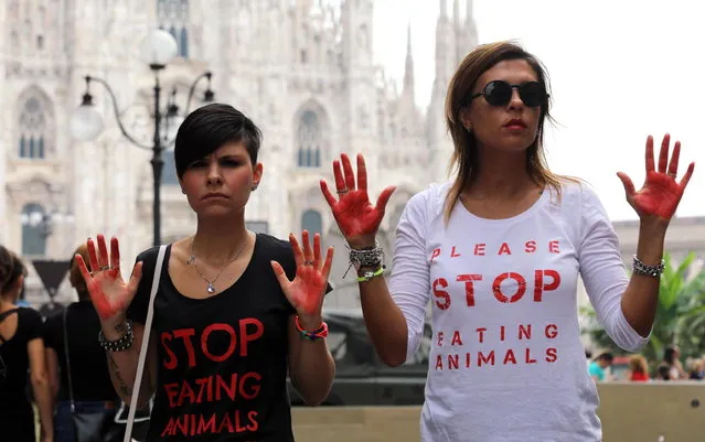 Animal rights activists protest against the use of animal leather in fashion businness, a few days before the fashion week opening in Milan, Italy, 16 September 2018. (Photo by Matteo Bazzi/EPA/EFE)